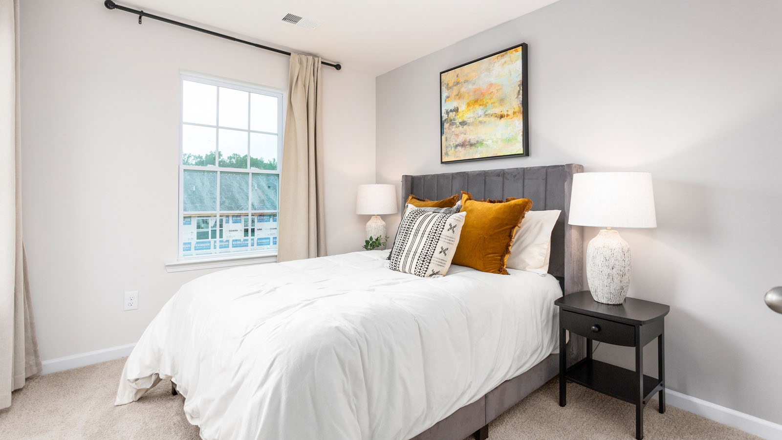 bedroom with carpet and ample light