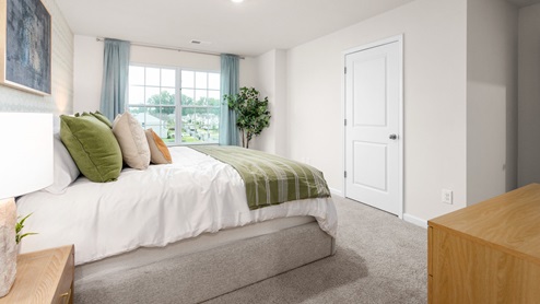 bedroom with carpet and ample light