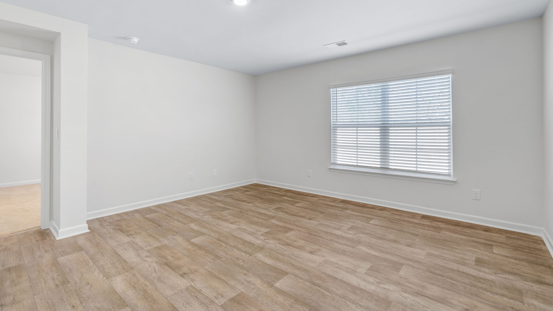 living room with vinyl flooring