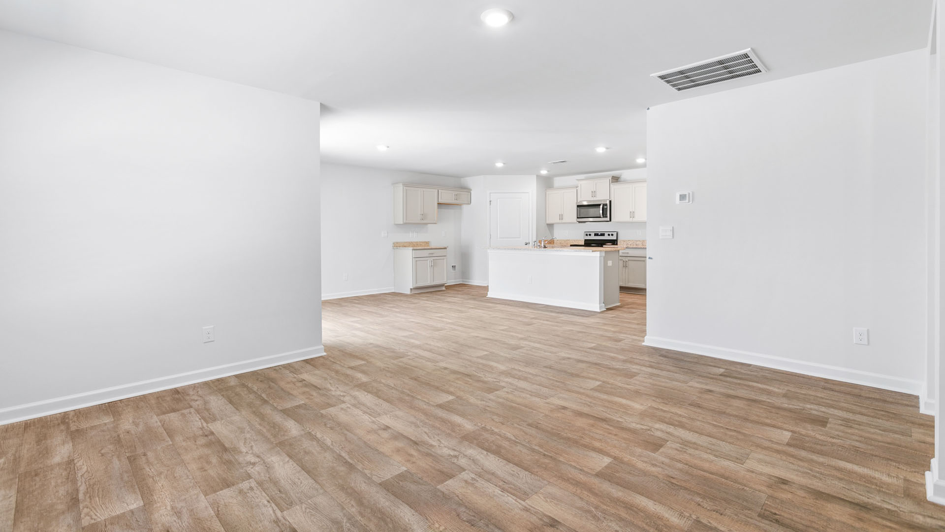 living room with vinyl flooring