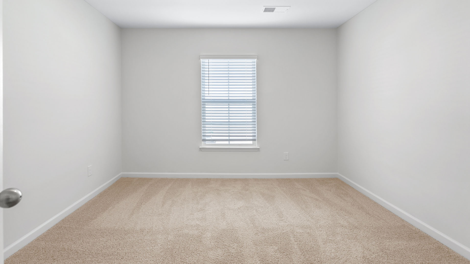 bedroom with carpet and 1 window