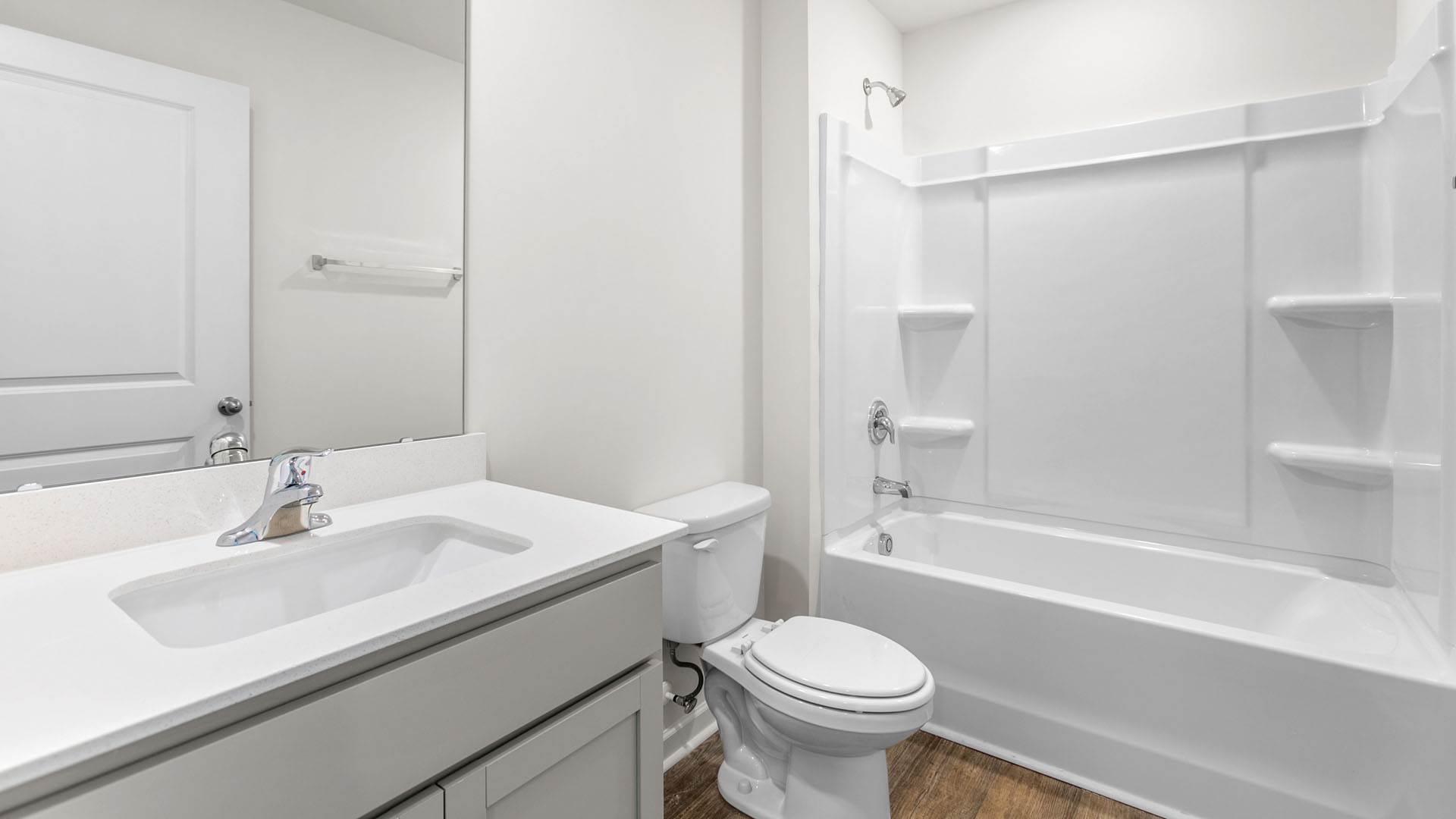 bathroom with tub shower combo