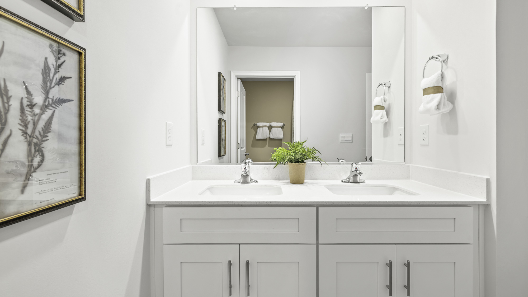 secondary bathroom with double sinks