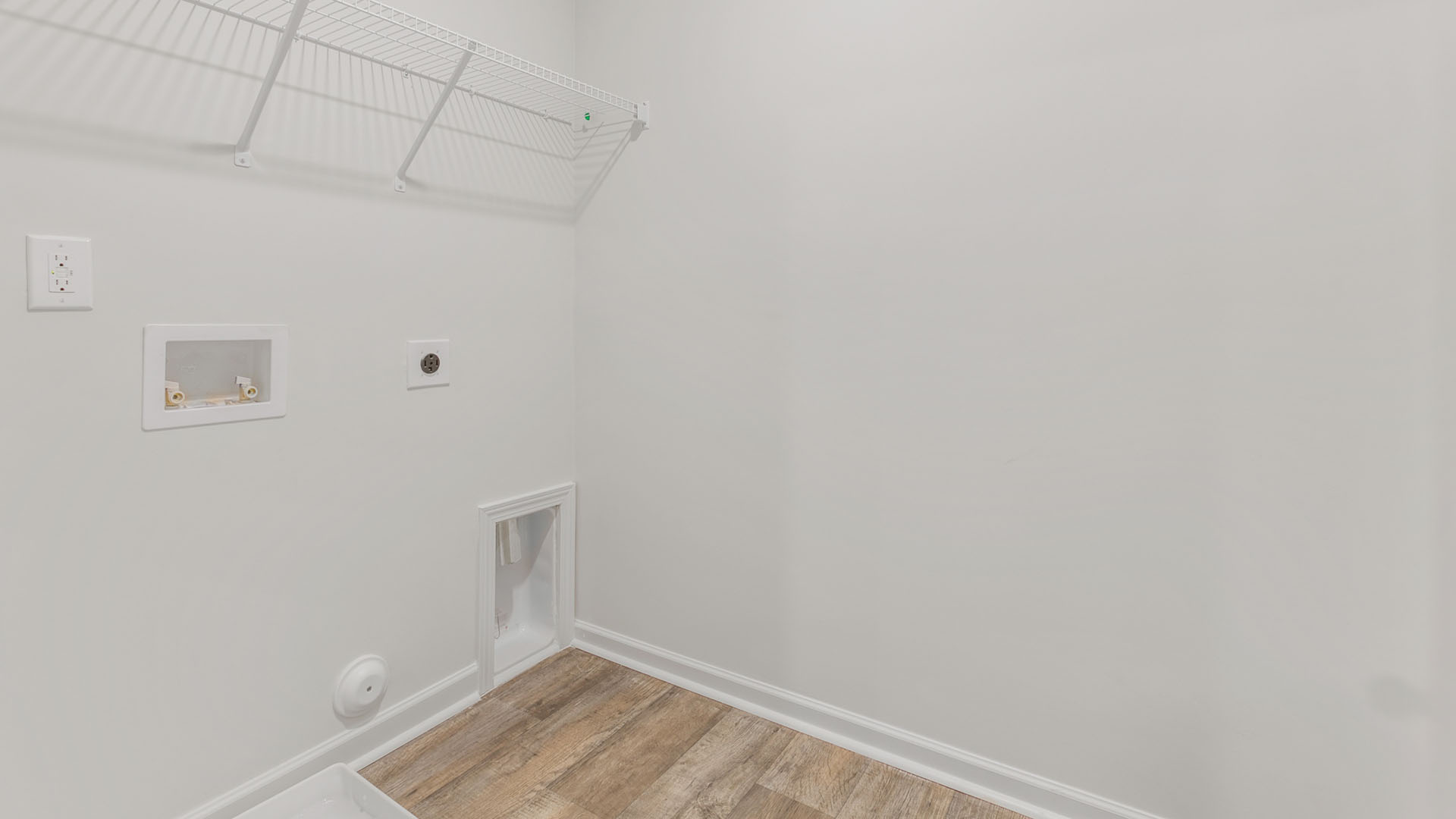 laundry room with wireshelving