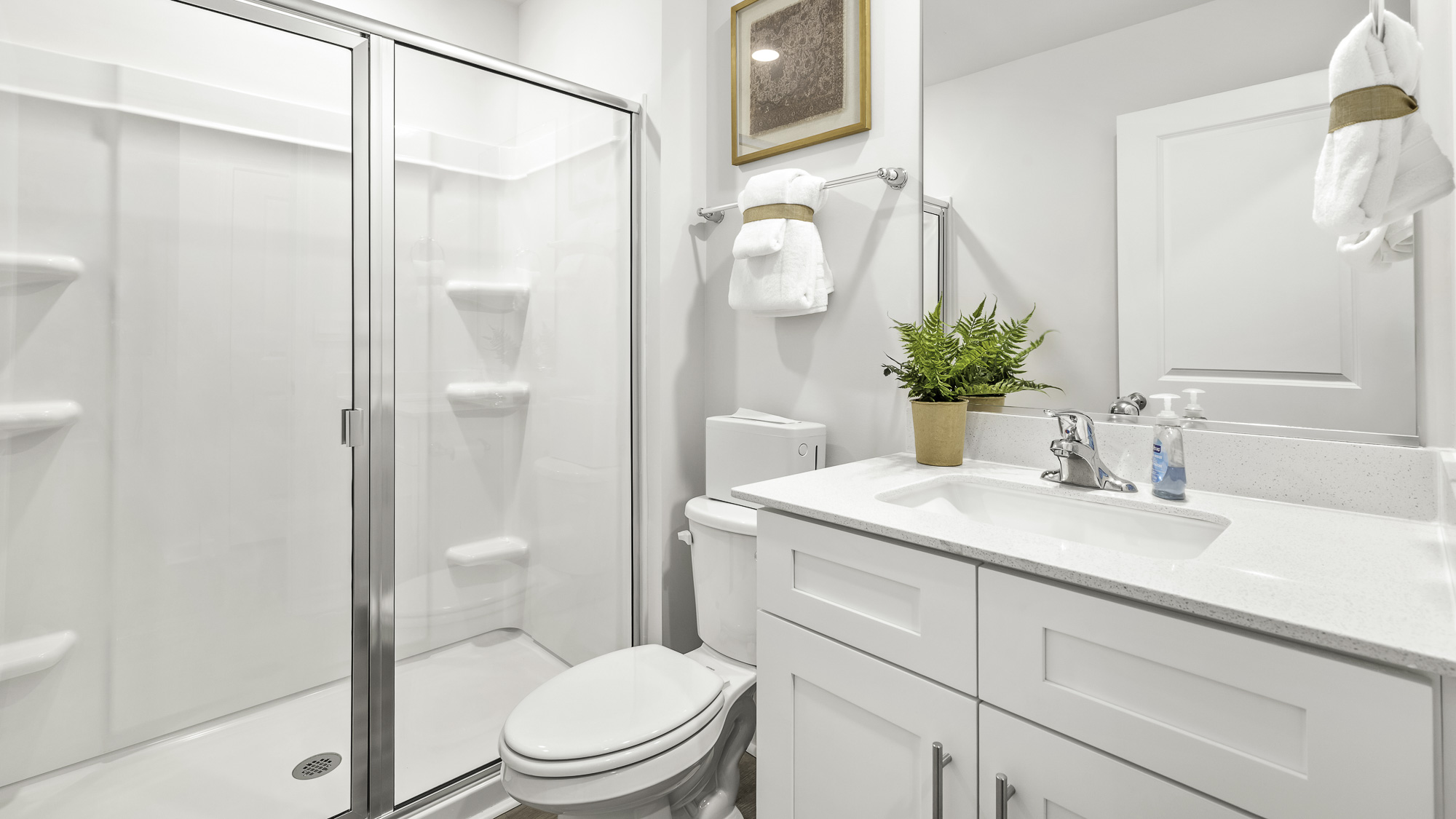 secondary bathroom with walk in shower