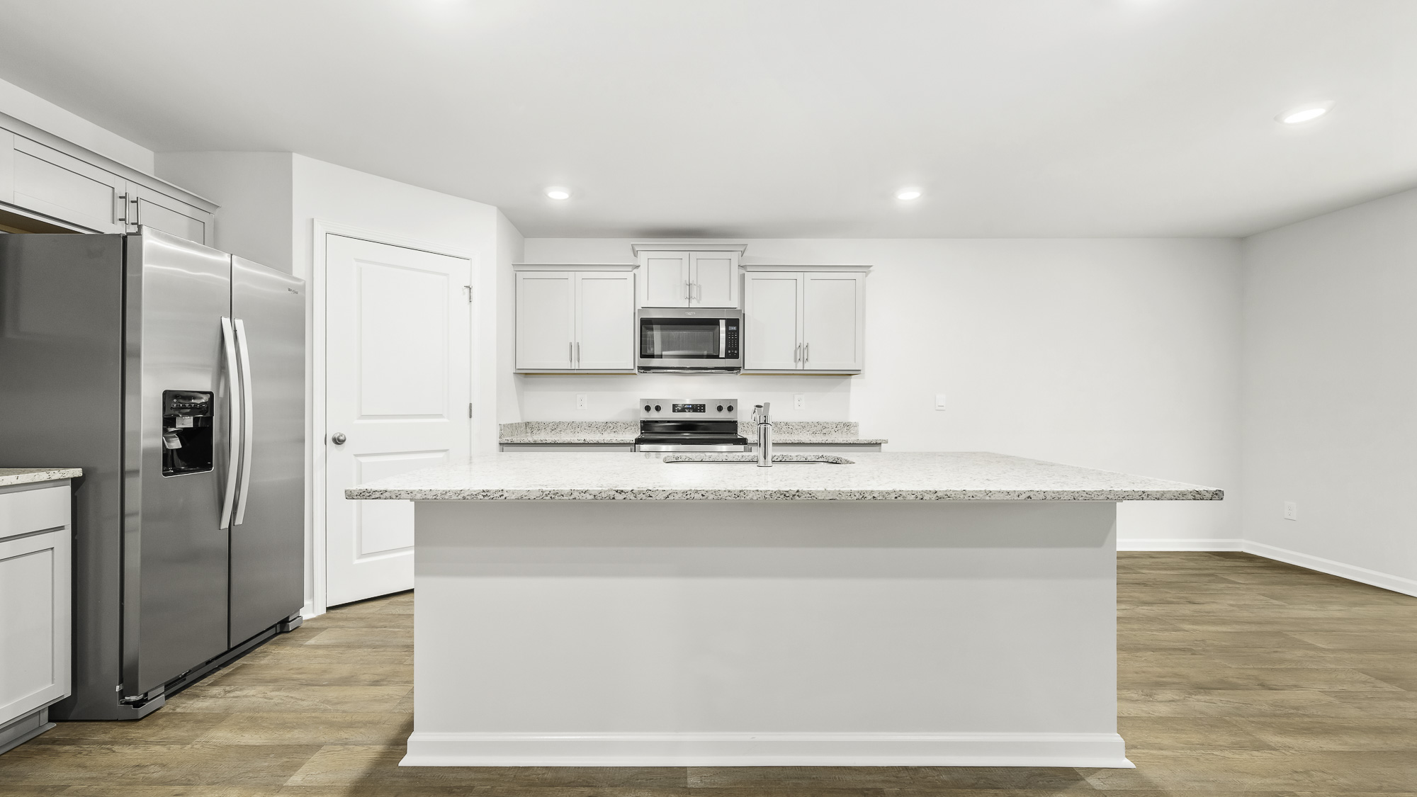 kitchen with an eat in island