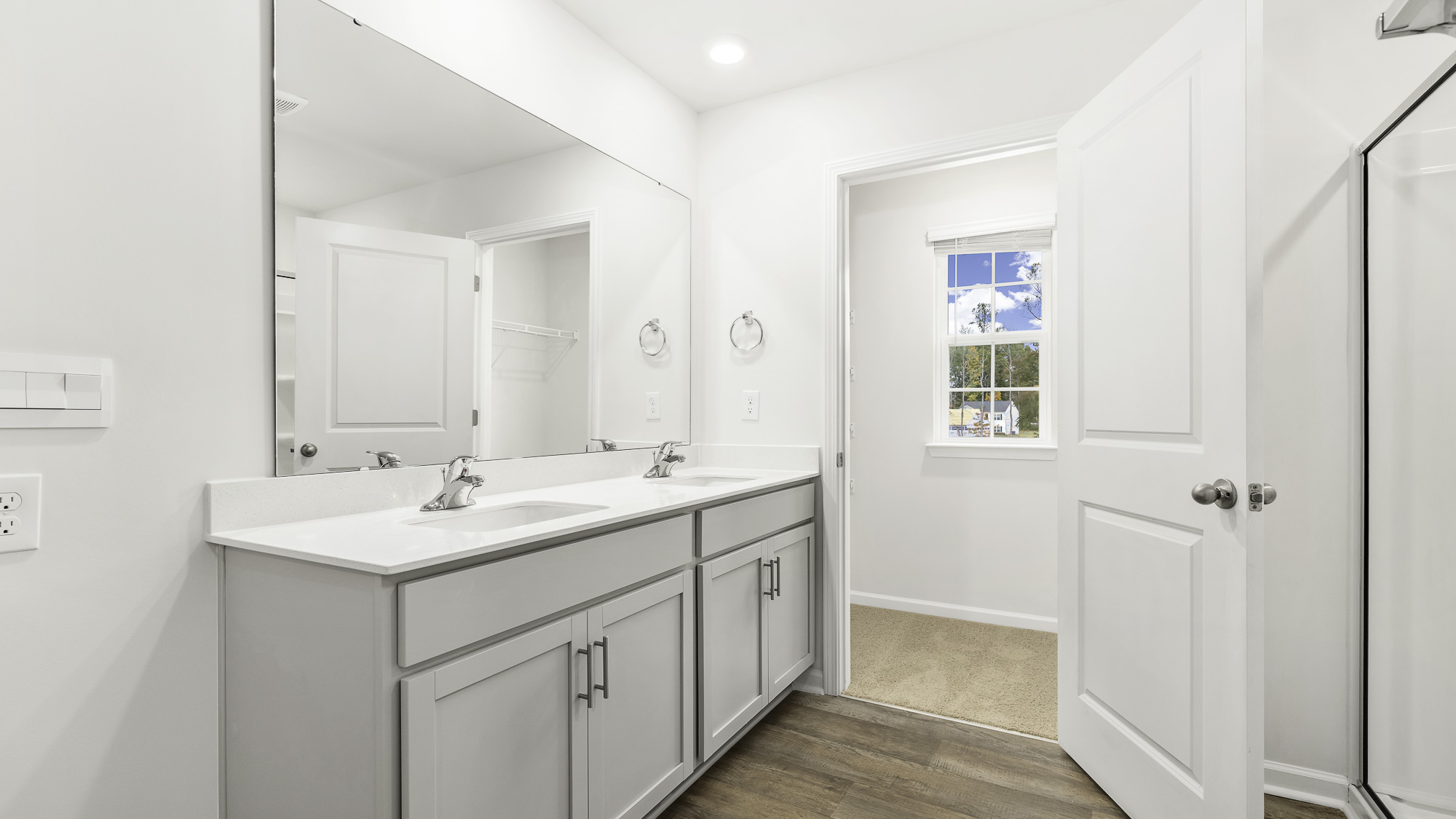 bathroom with dual sinks