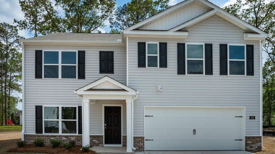 Two story home with vinyl siding