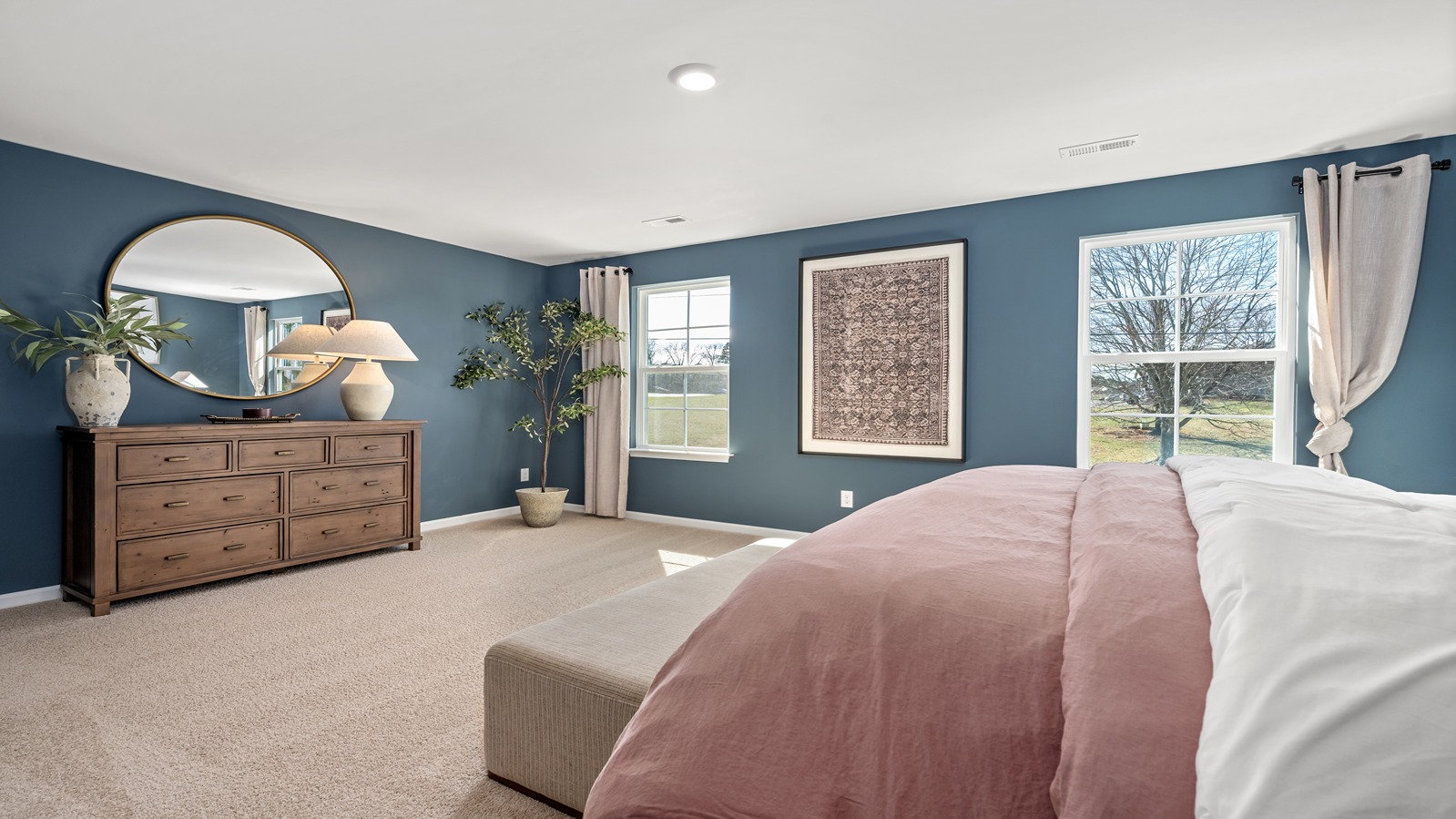 primary bedroom with carpet