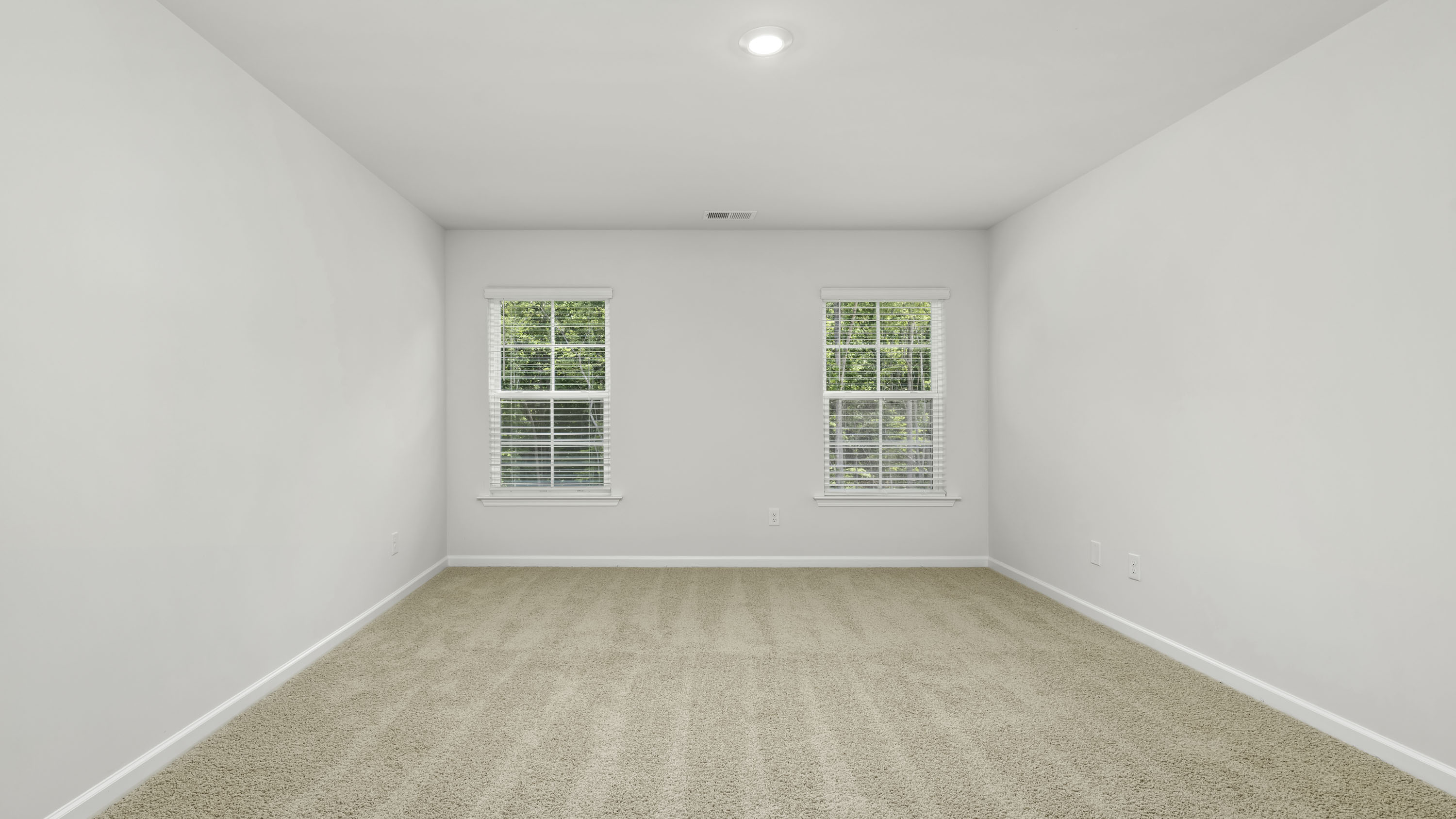 secondary bedroom with windows