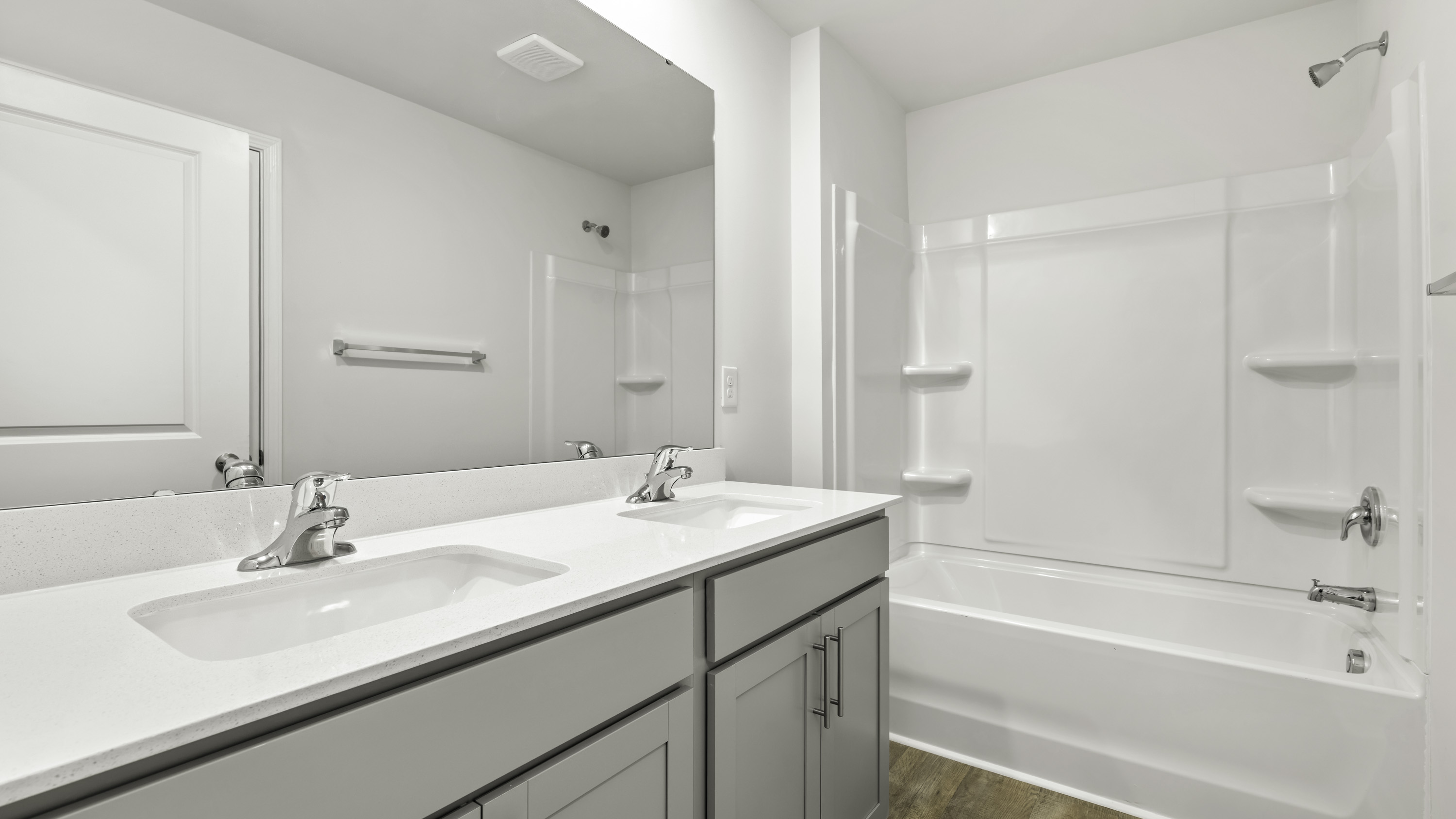 dual sinks and tub shower
