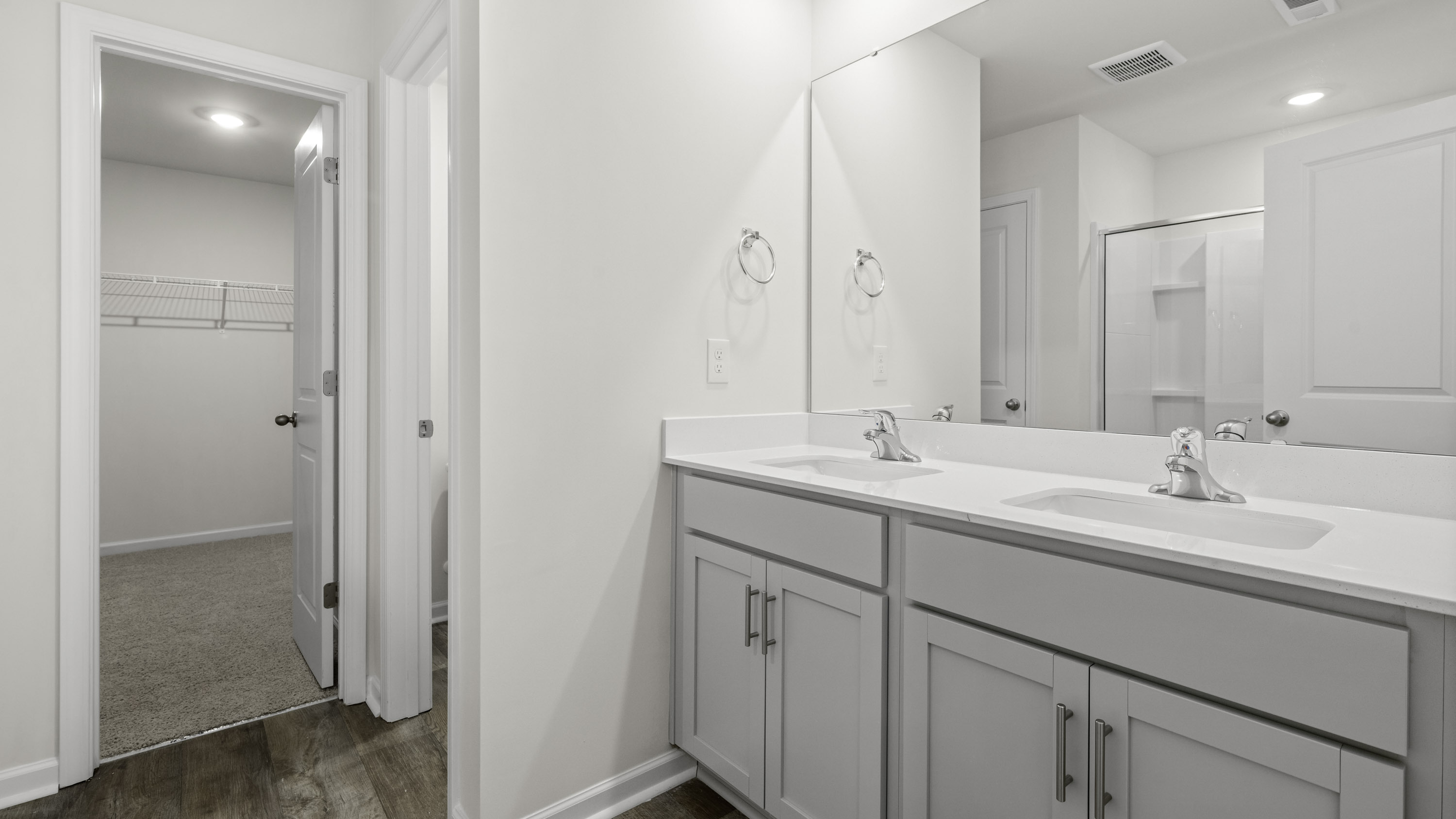 primary bathroom and walk in closet
