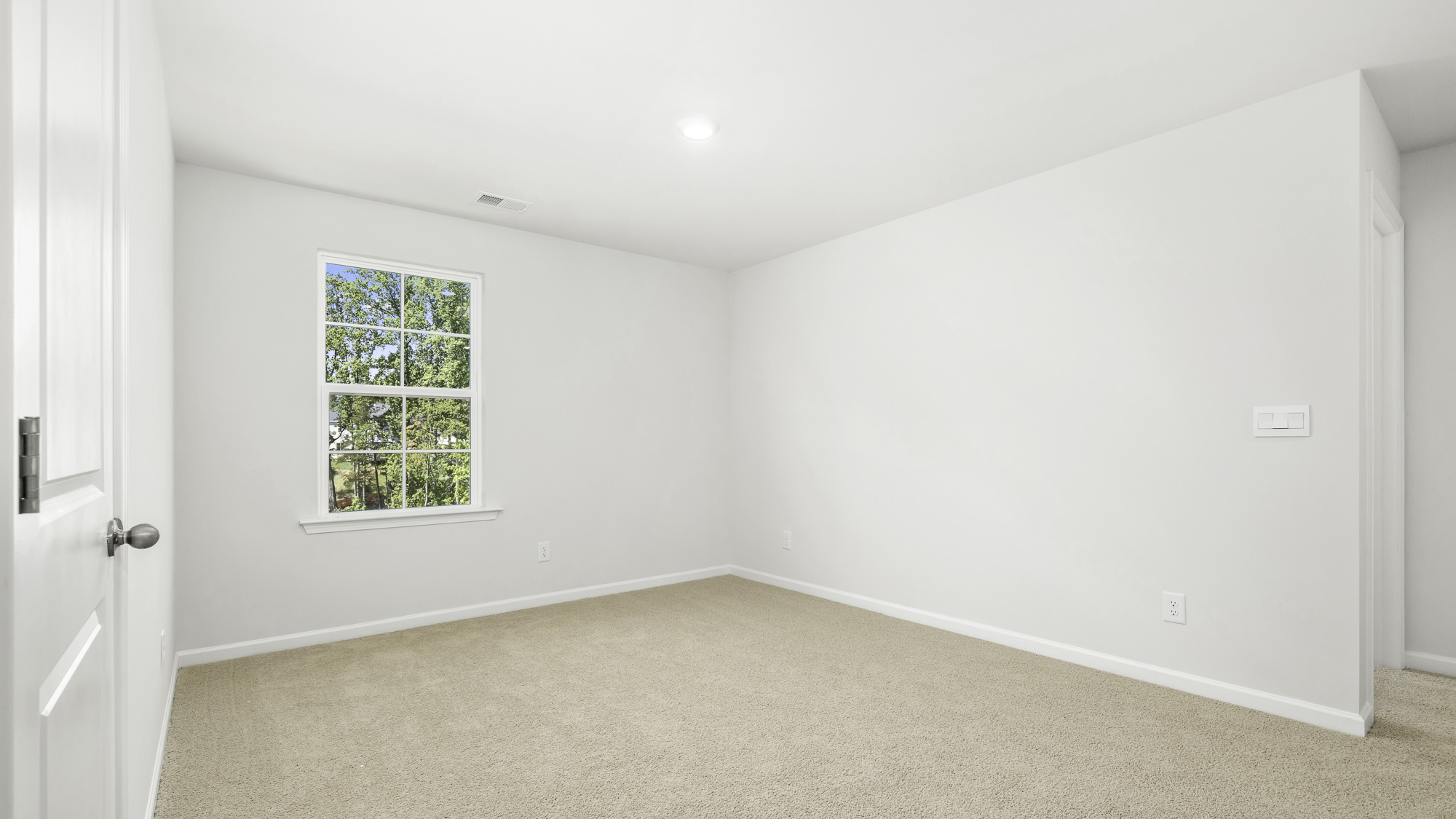 secondary bedroom with window