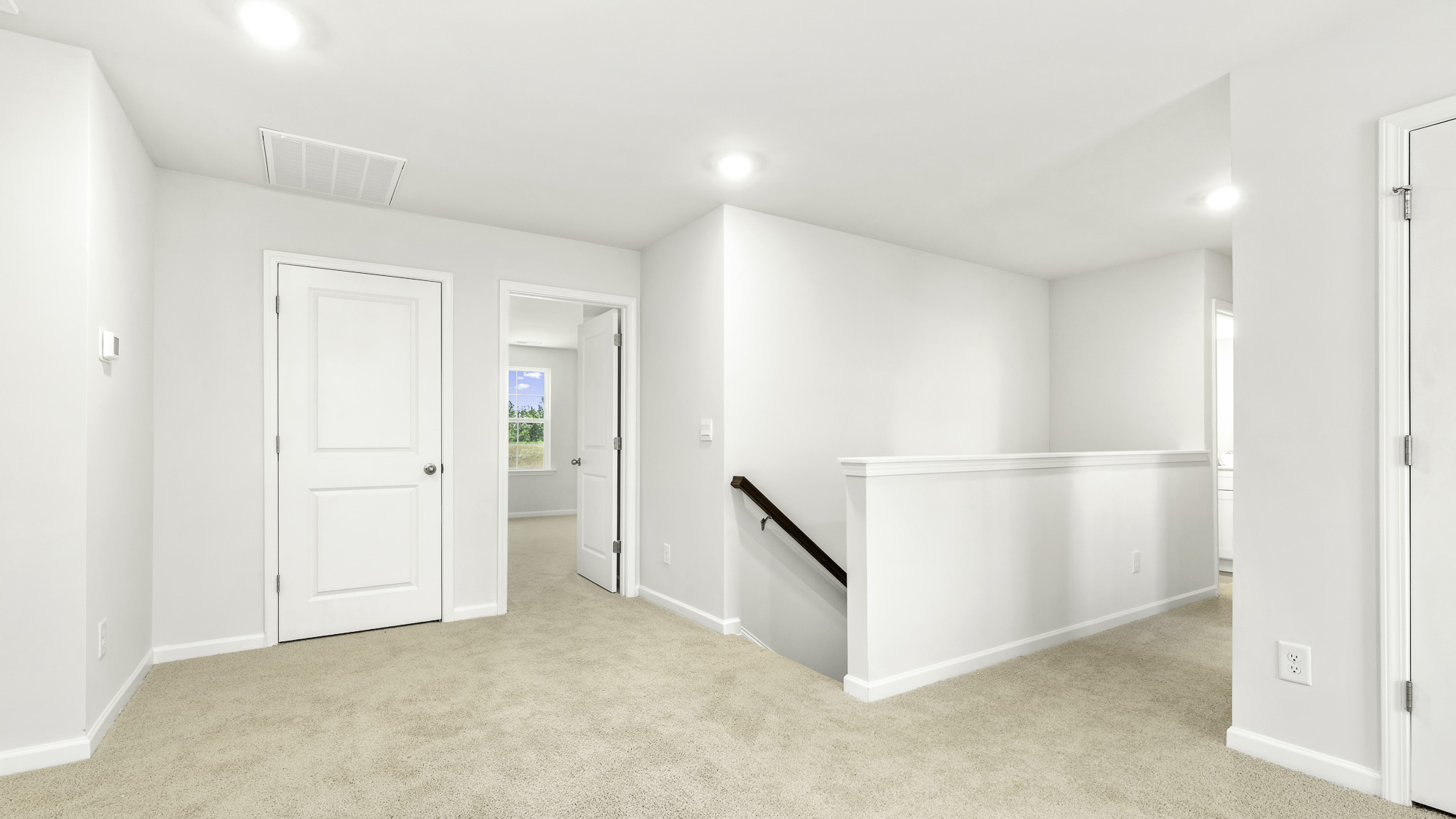 view of stairs from loft
