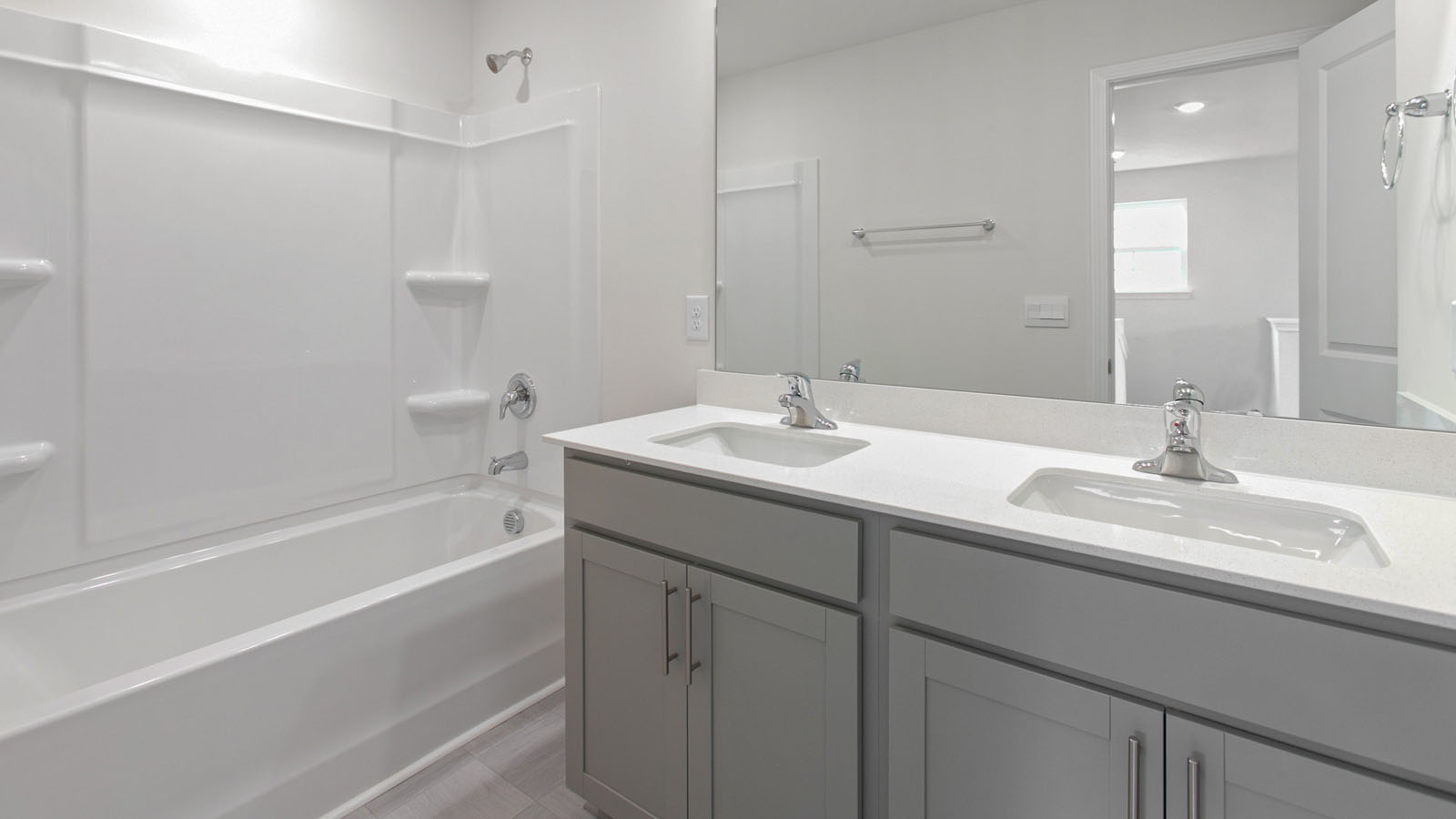 dual sinks and tub shower