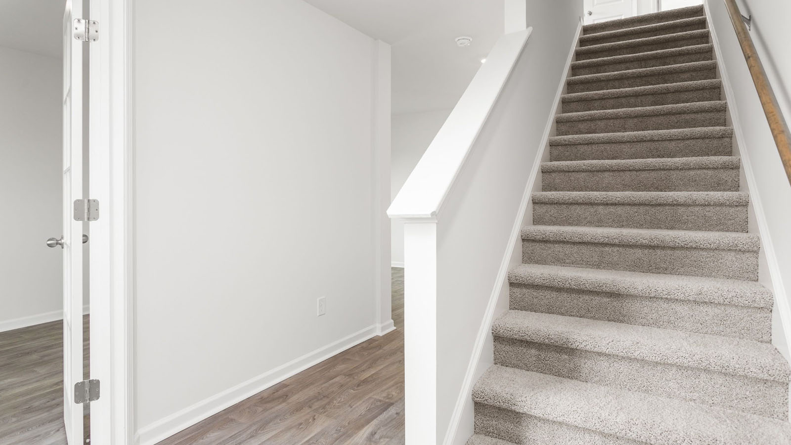 FRONT ENTRANCE WITH STAIRCASE VIEW