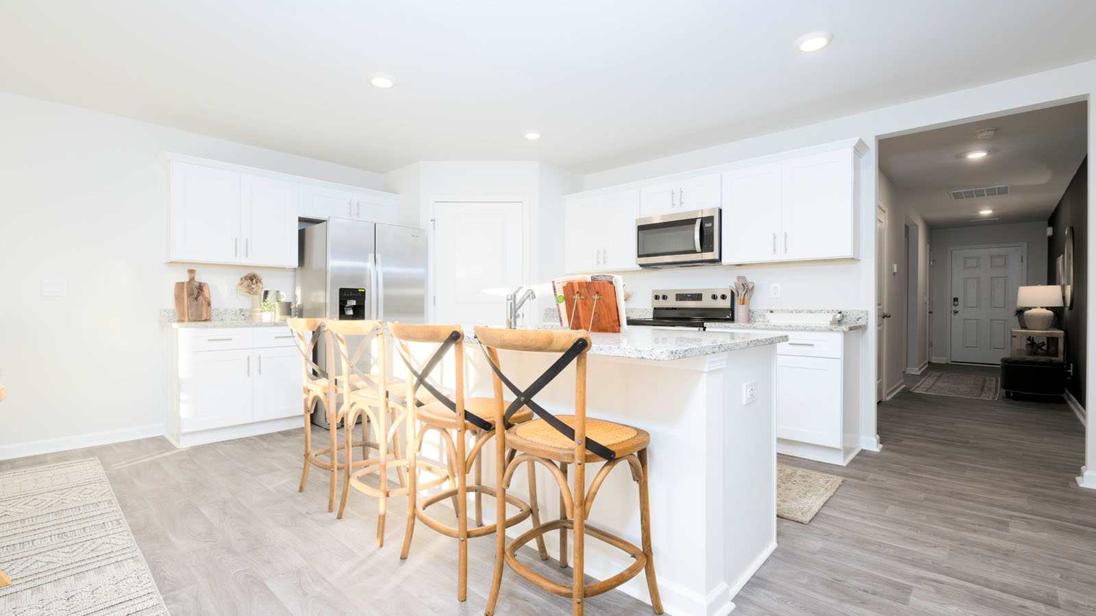 kitchen with white cabinets and granite countertops