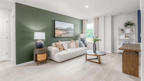 loft with carpet located upstairs