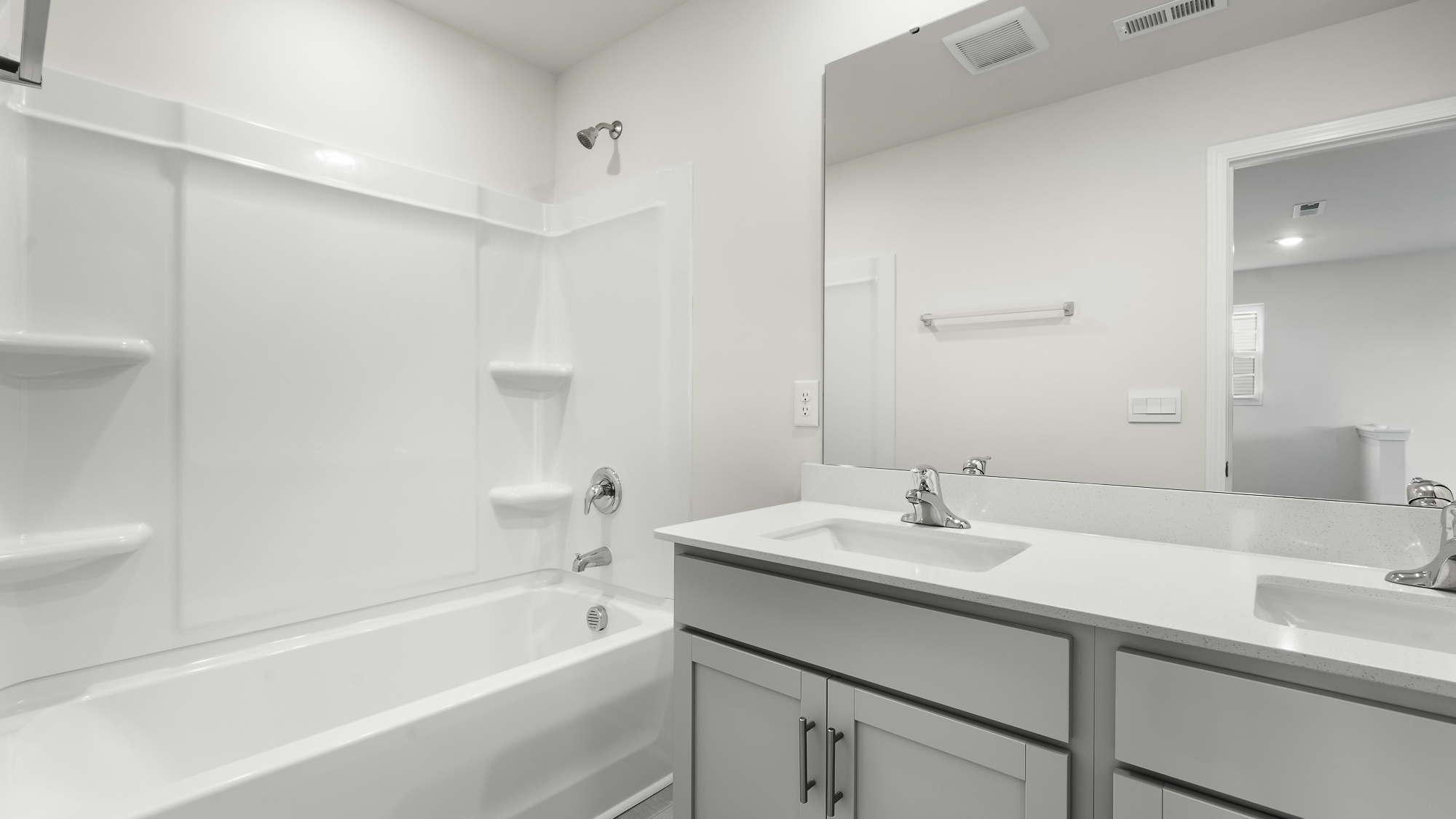 secondary bathroom with tub shower