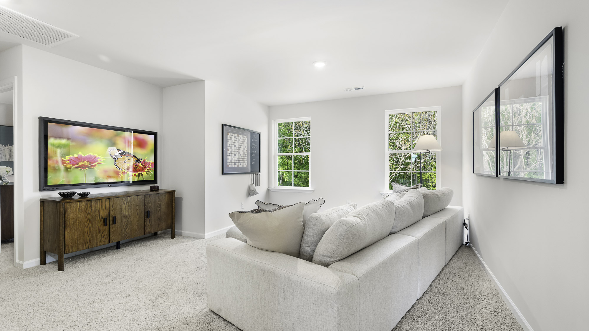 loft with window and carpet
