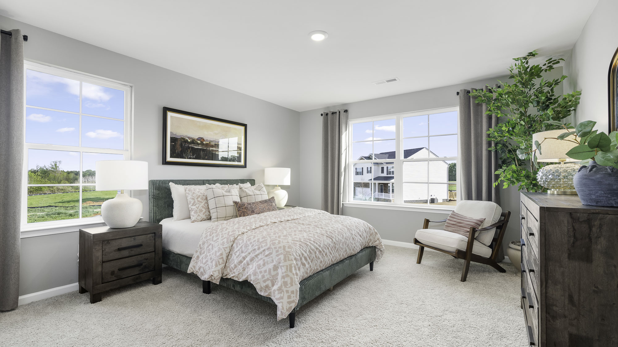 secondary bedroom with multiple windows windows