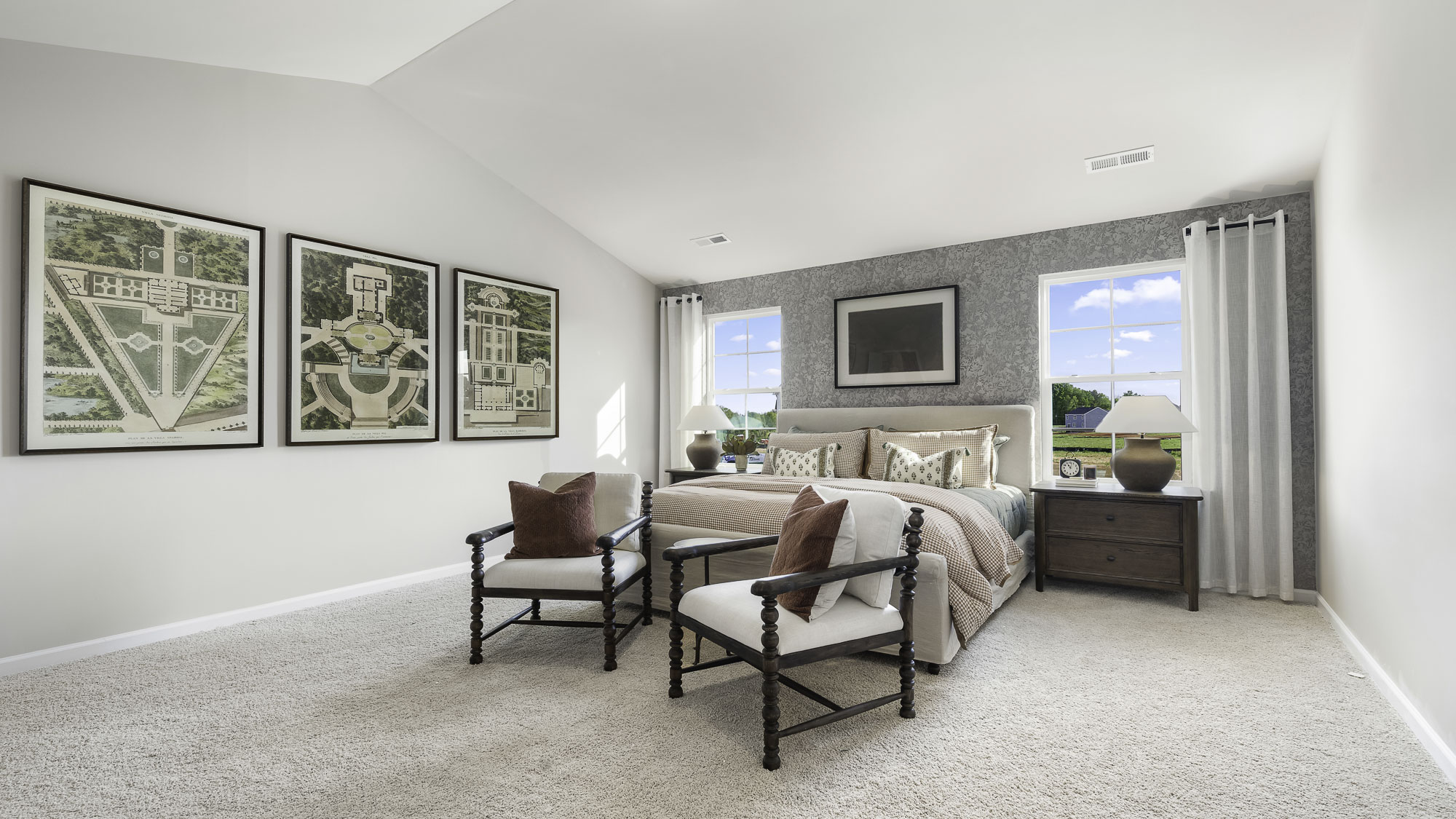 primary bedroom with windows