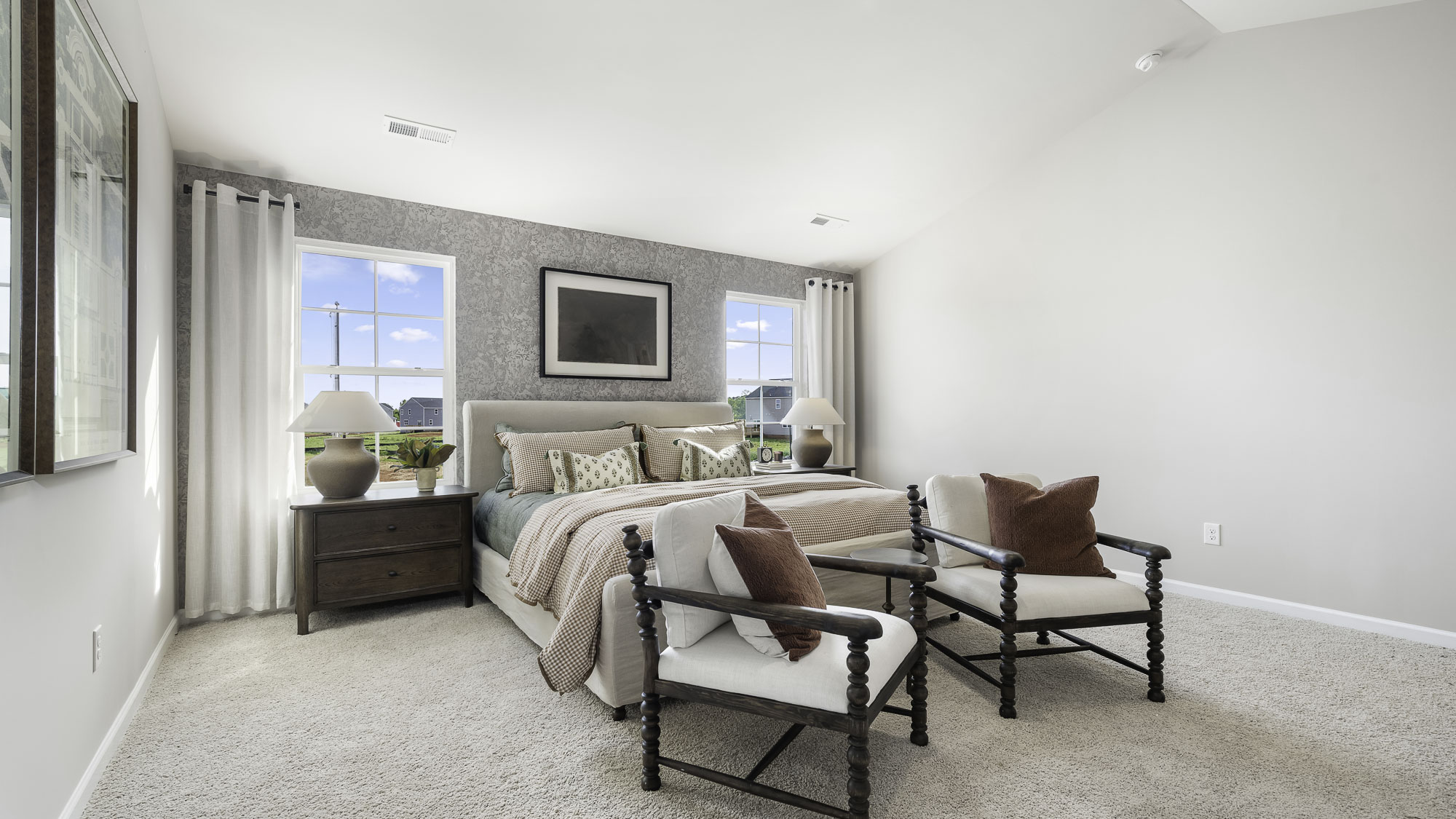 primary bedroom with carpet