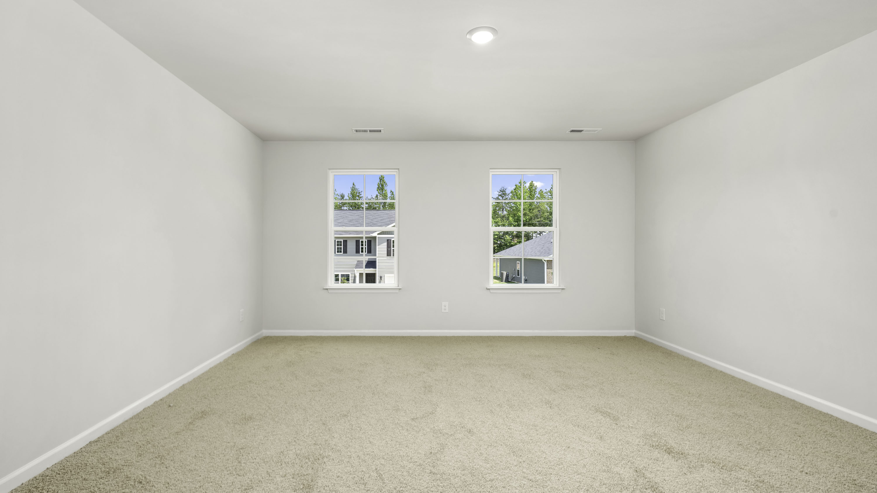 bedroom with 2 windows