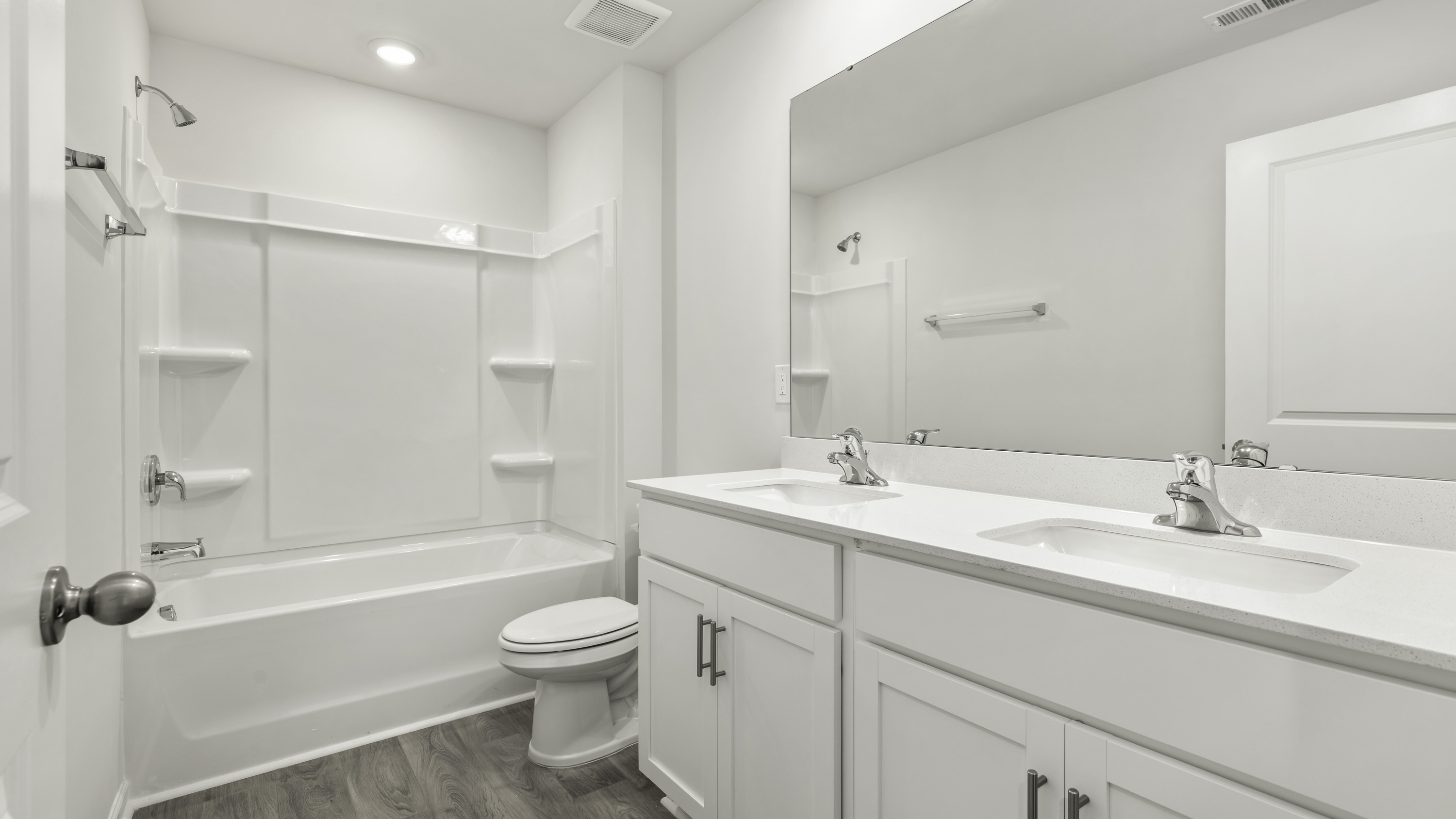 bathroom with dual isnks