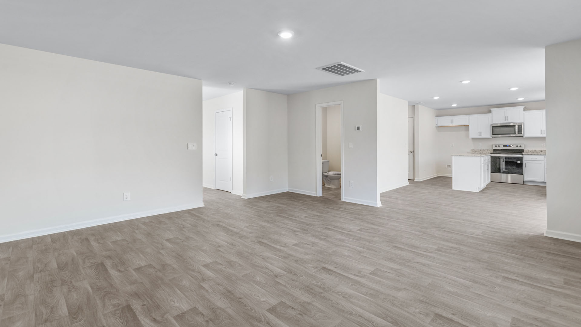 living room with vinyl flooring
