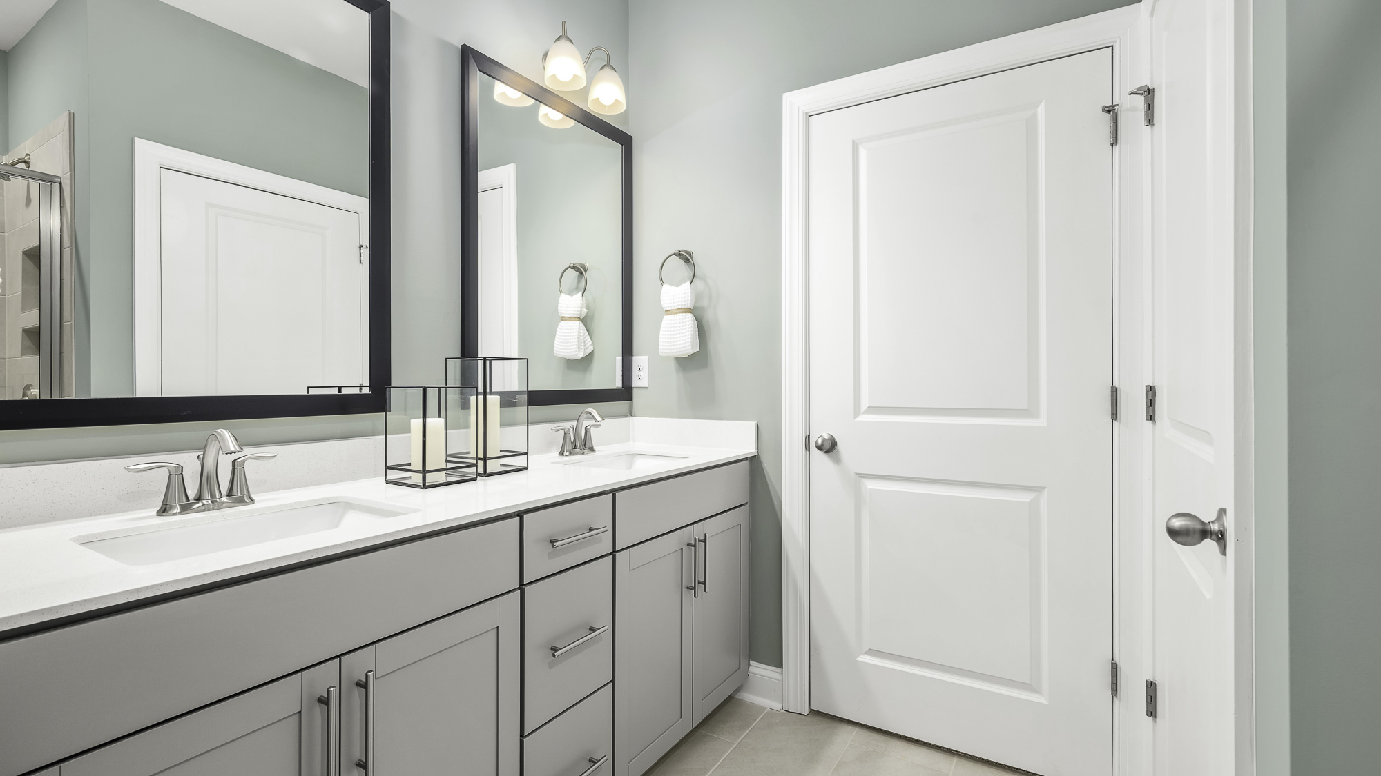 bathroom with dual sinks