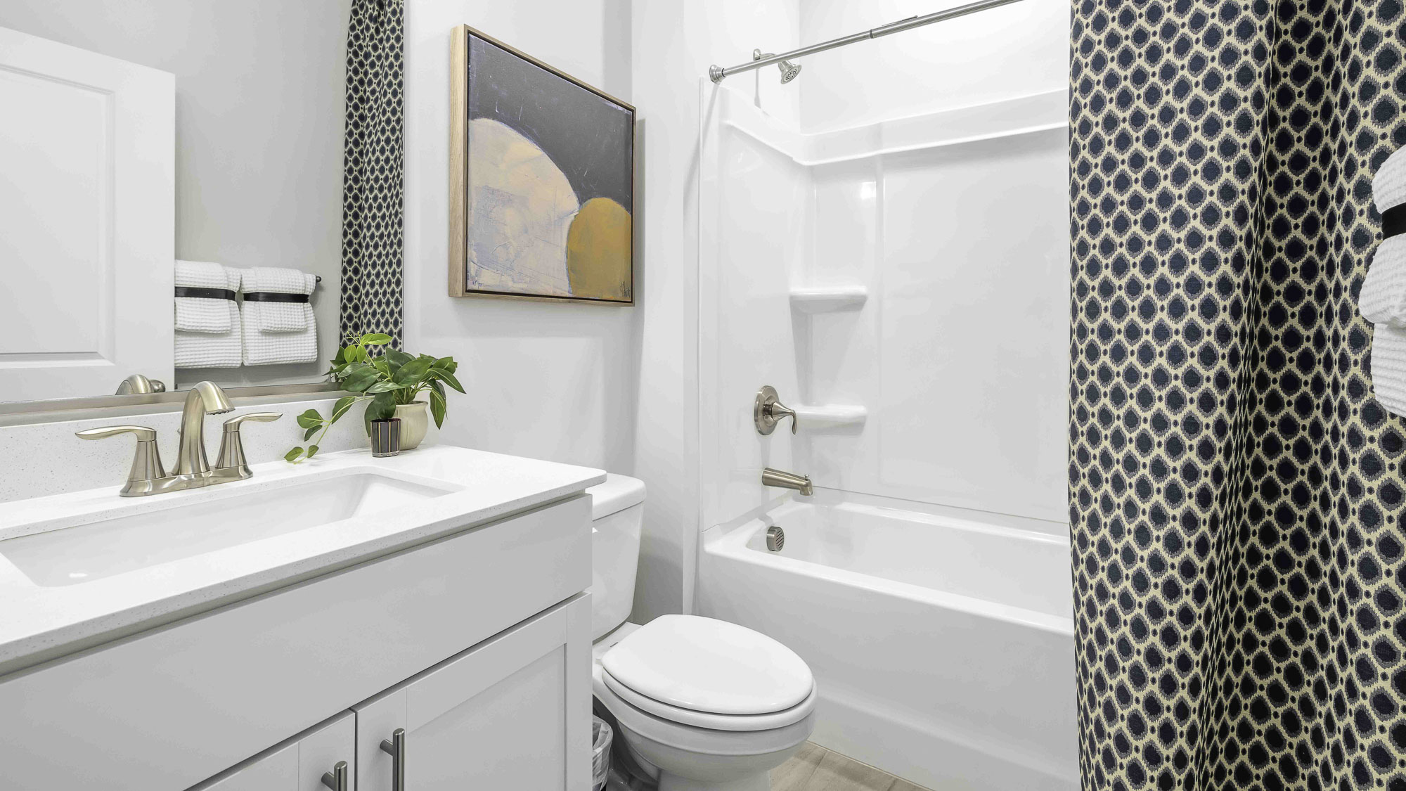 secondary bathroom with tub shower
