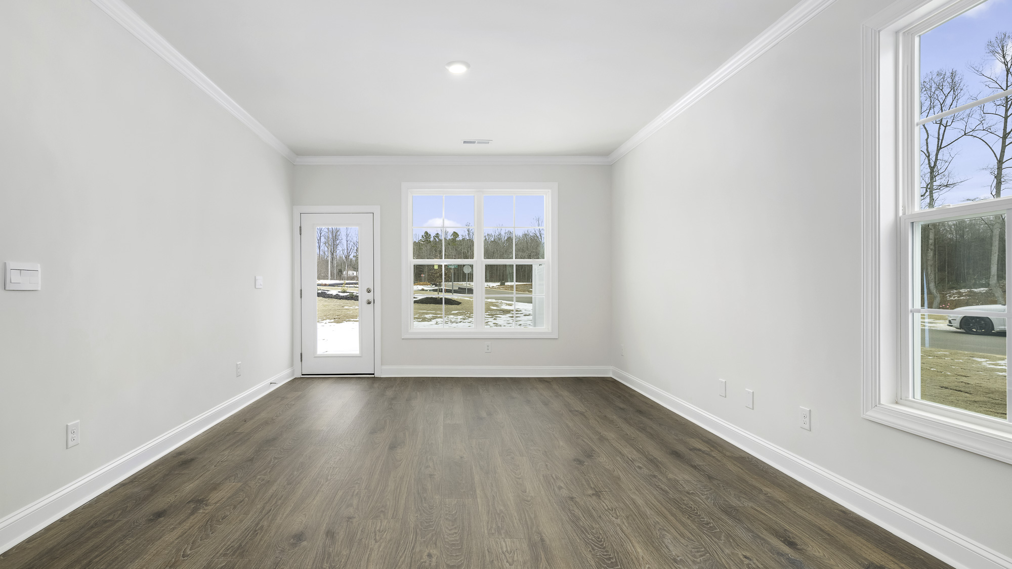 living room with revwood flooring