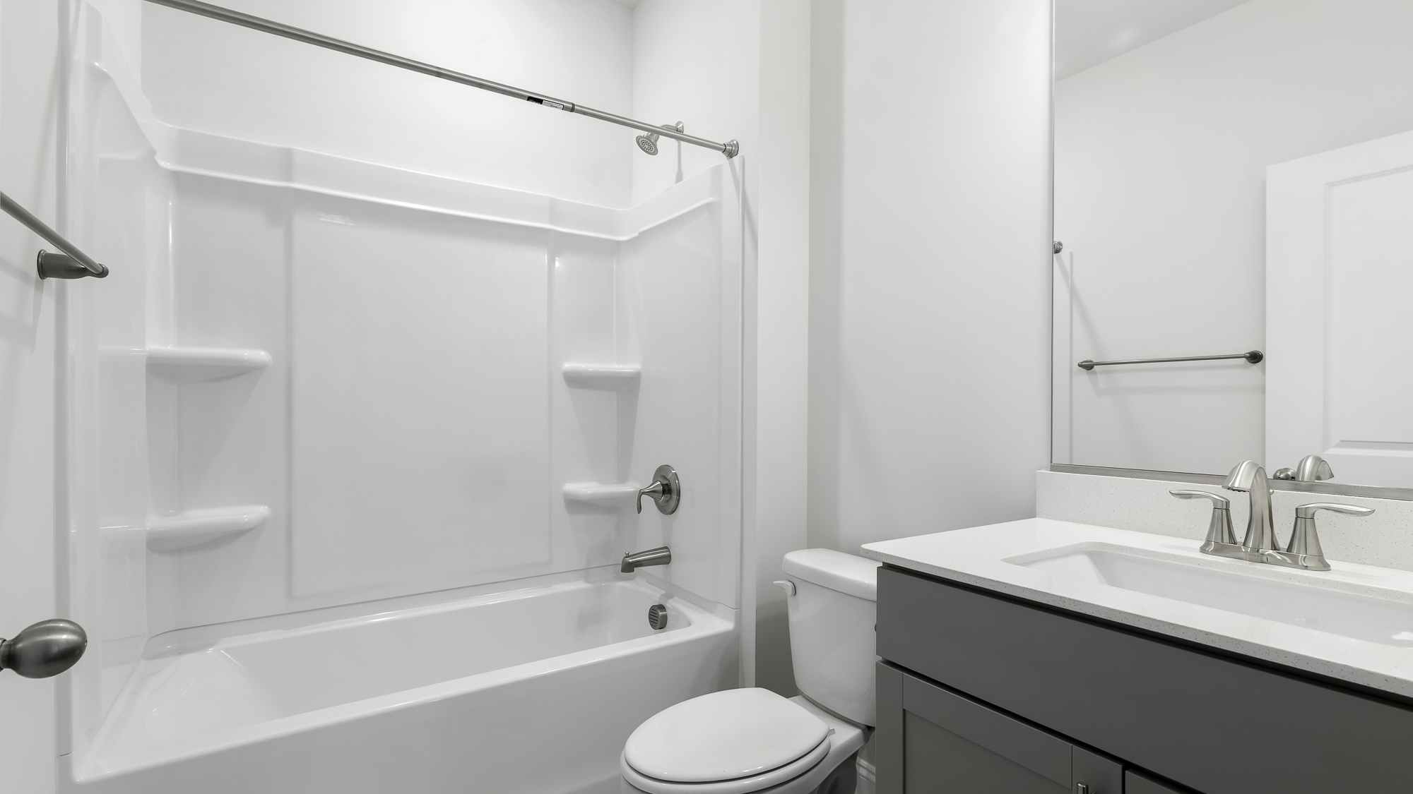 bathroom with tub shower combo