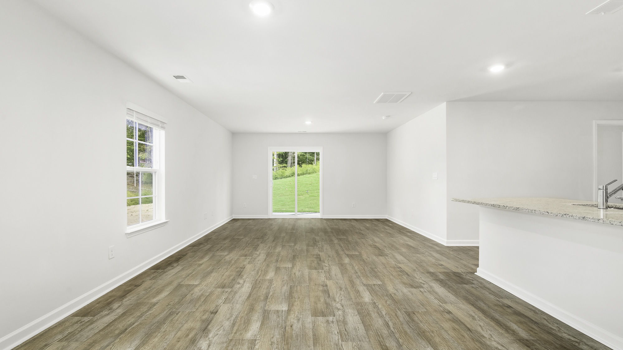 living room with vinyl flooring s