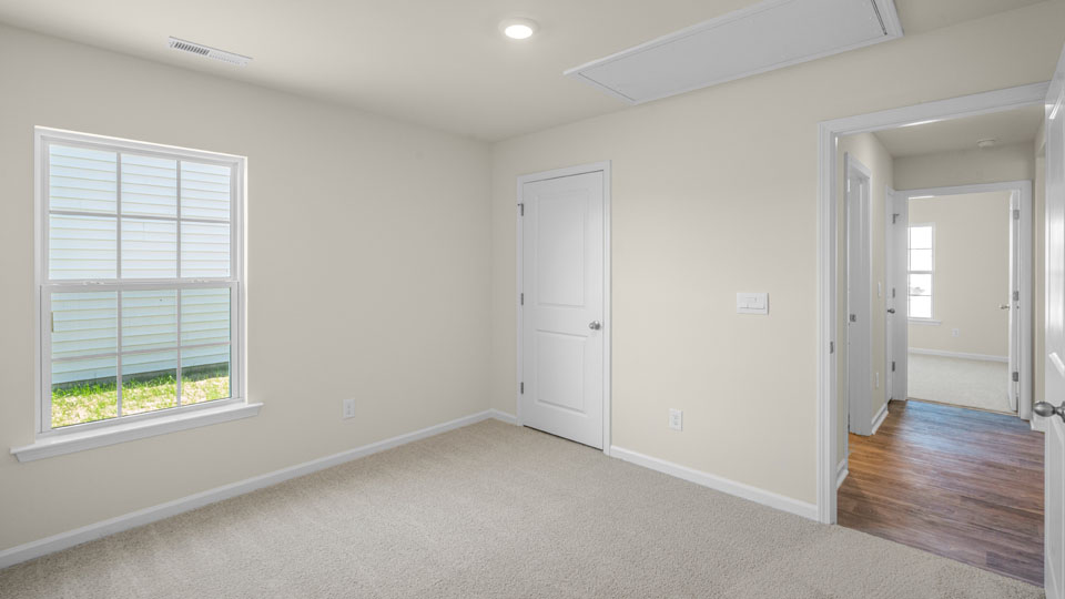 secondary bedroom with carpet