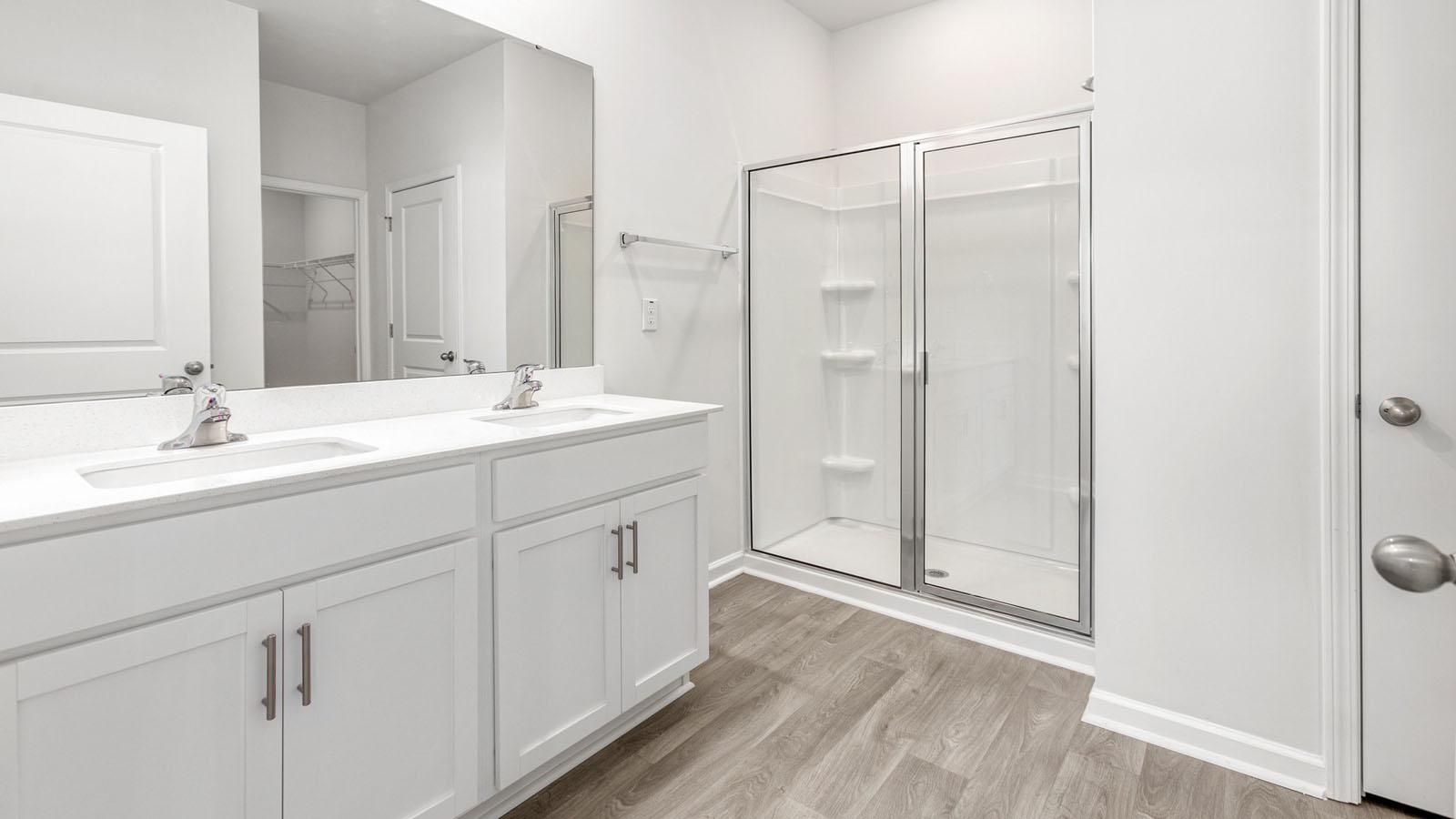 bathroom with dual sinks