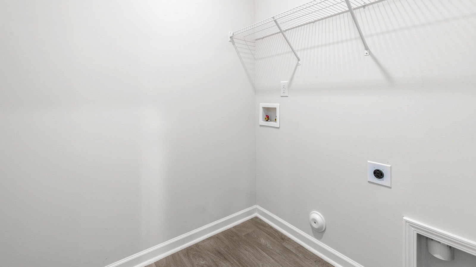 laundry room with wire shelving