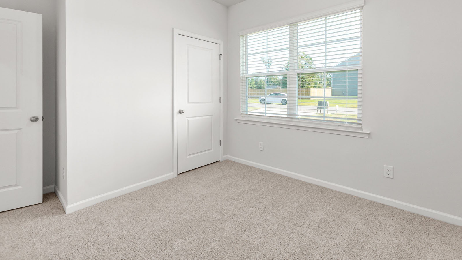bedroom with 2 windows