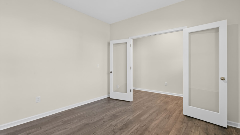 study with revwood flooring and french doors