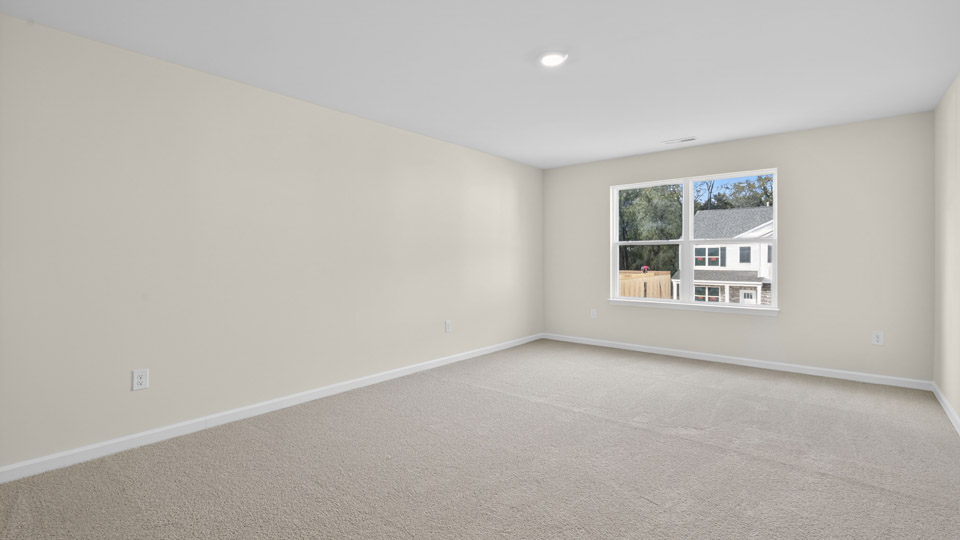loft with carpet flooring