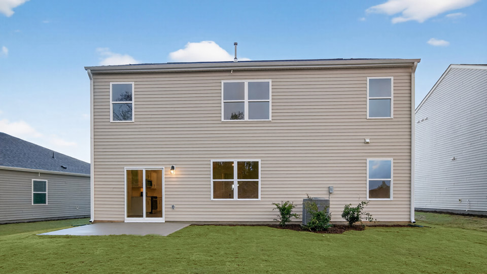 hayden backyard with uncovered concrete patio