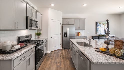 Kitchen with stainless steel appliances and granite countertops