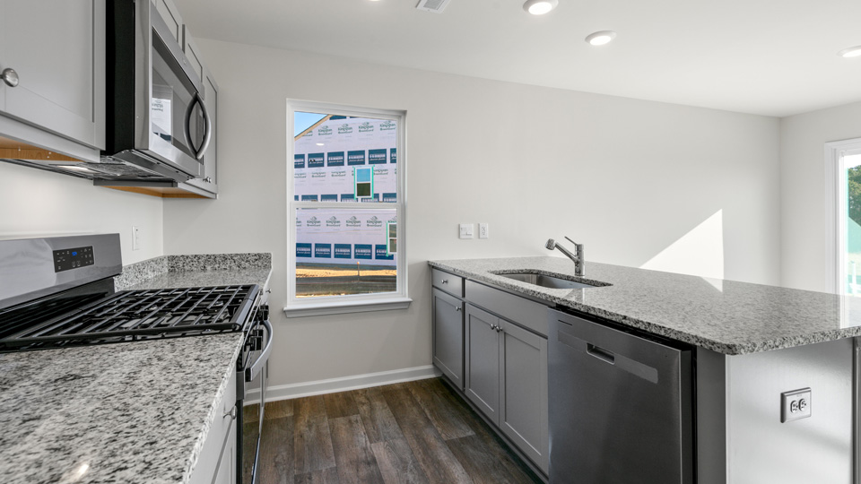 Kitchen with grey cabinets