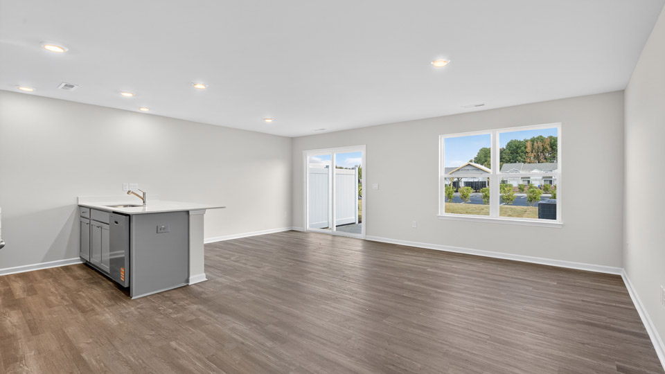 living room with revwood flooring
