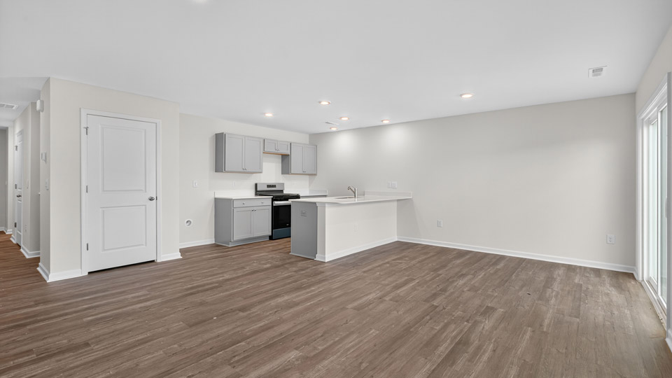 living room with revwood flooring