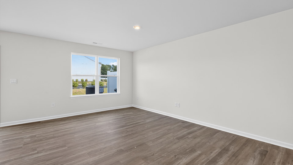 living room with revwood flooring