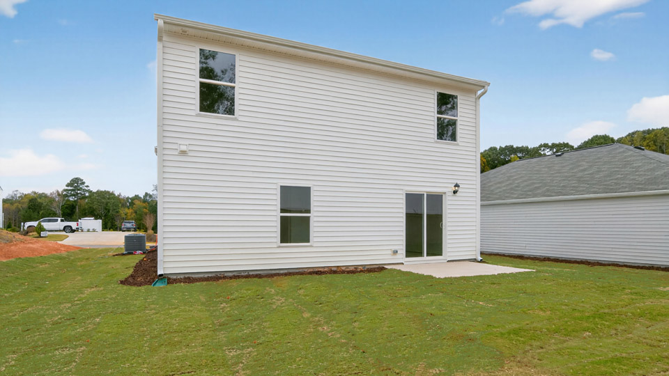 robie backyard with uncovered concrete patio