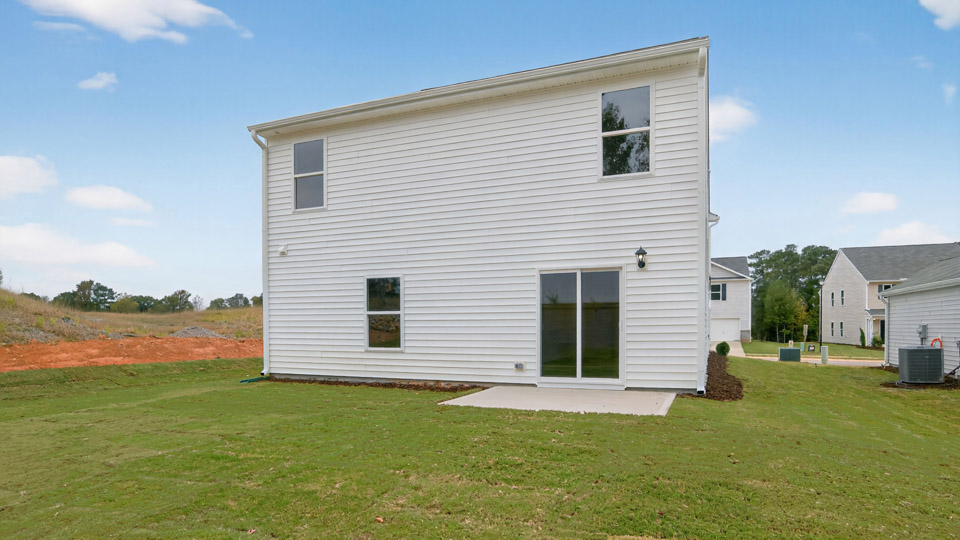 robie backyard with uncovered concrete patio