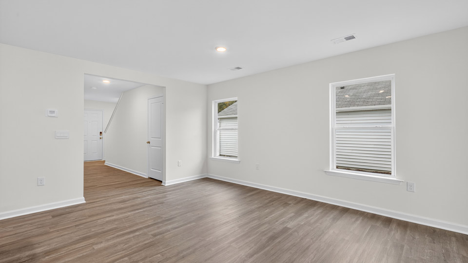 living room with revwood flooring